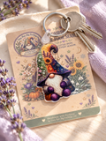 Four Seasons Gonk Keyring on branded backing card